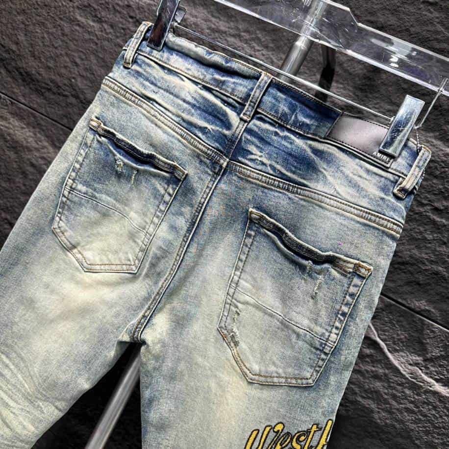 Amiri Ripp White Yellow Logo Jeans – AMIJ010