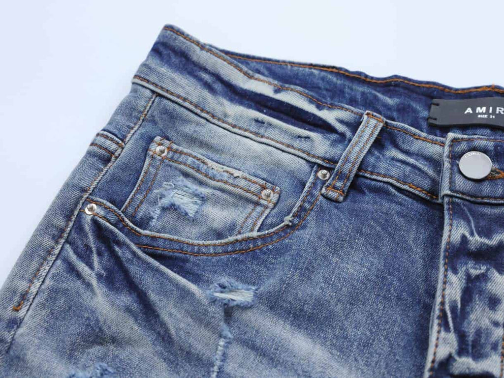 Amiri Distressed Blue Rip Jeans – AMIJ046