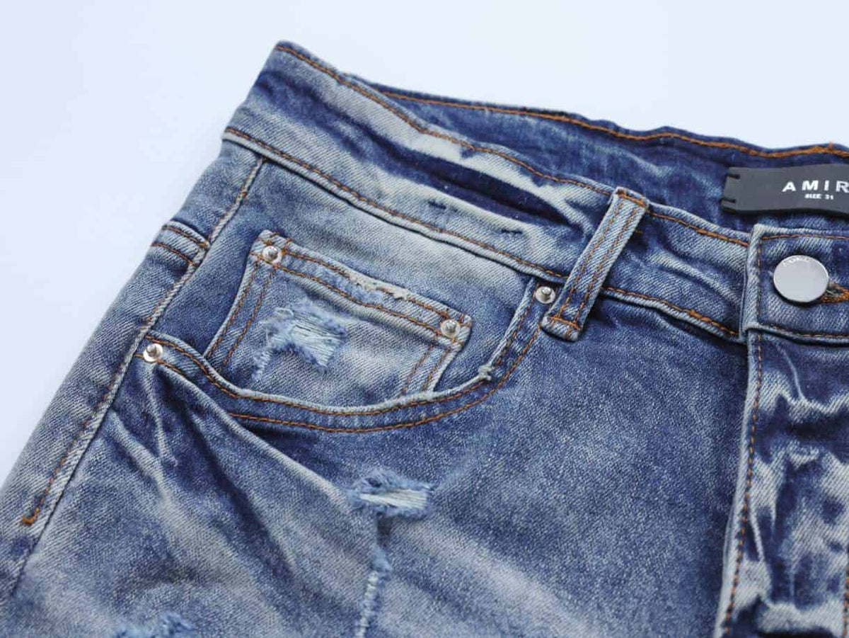 Amiri Distressed Blue Rip Jeans – AMIJ046