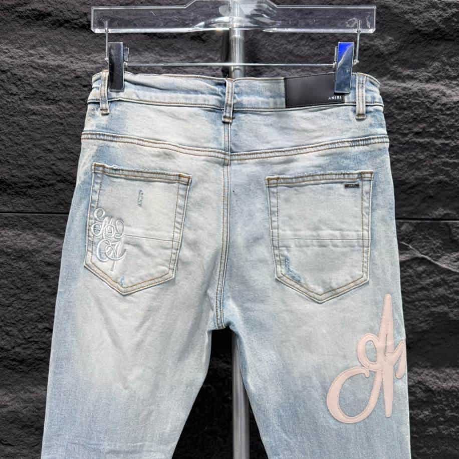 Amiri Men Blue Script Logo Jeans – AMIJ017