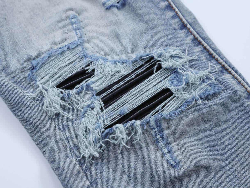 Amiri Distressed Blue Rip Jeans – AMIJ046