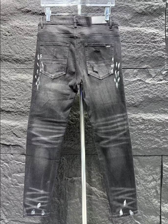 Amiri Ripp Black Patch-Detail Jeans – AMIJ021