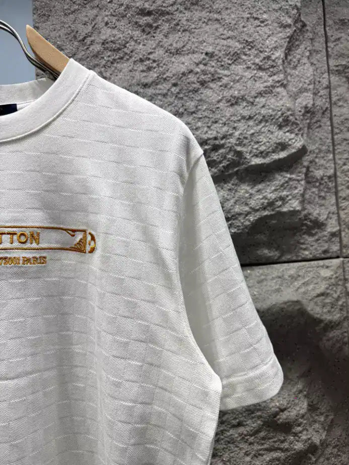 LOUIS VUITTON EMBELLISHED DAMIER PIQUE T-SHIRT – LVTS162