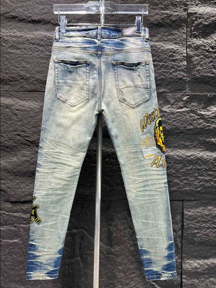 Amiri Ripp White Yellow Logo Jeans – AMIJ010
