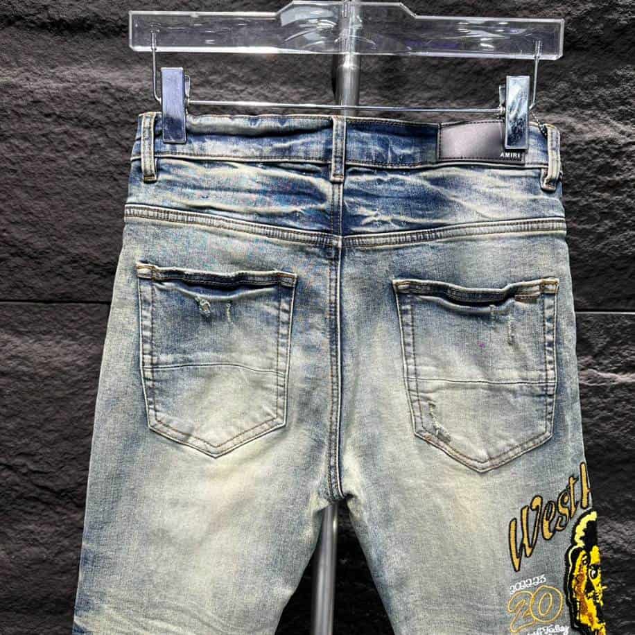 Amiri Ripp White Yellow Logo Jeans – AMIJ010