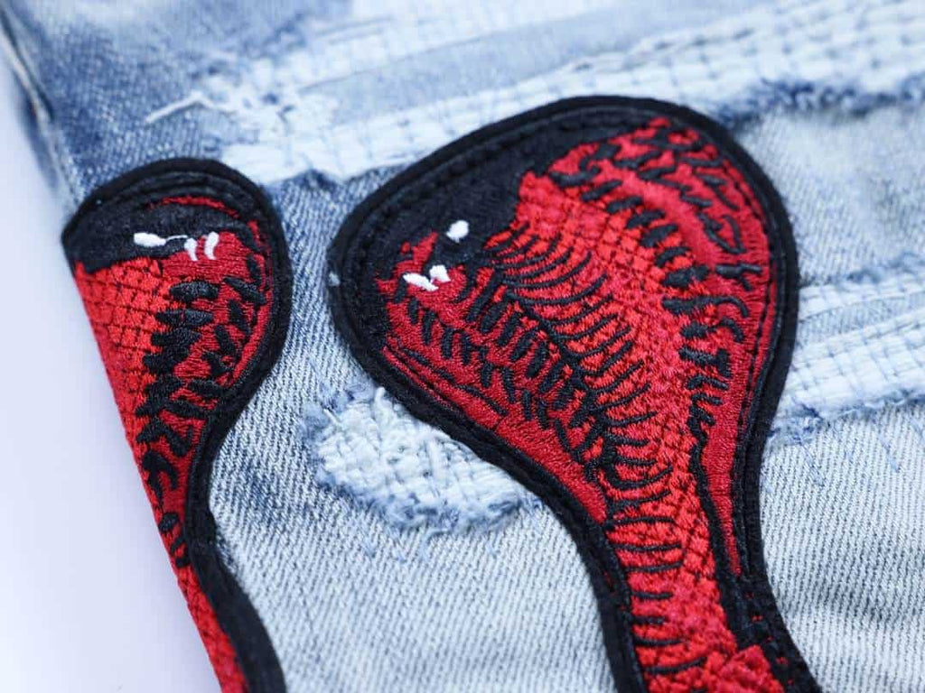 Amiri Red Snake Archival Rip Jeans – AMIJ047