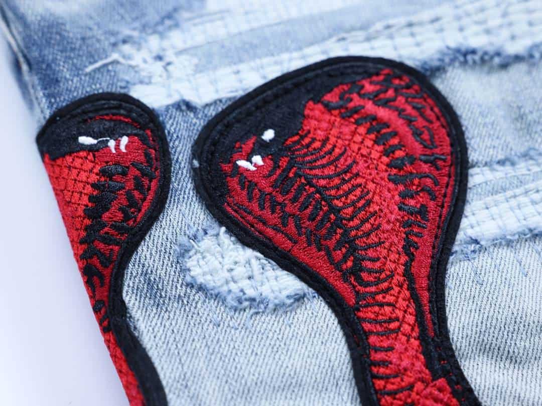 Amiri Red Snake Archival Rip Jeans – AMIJ047