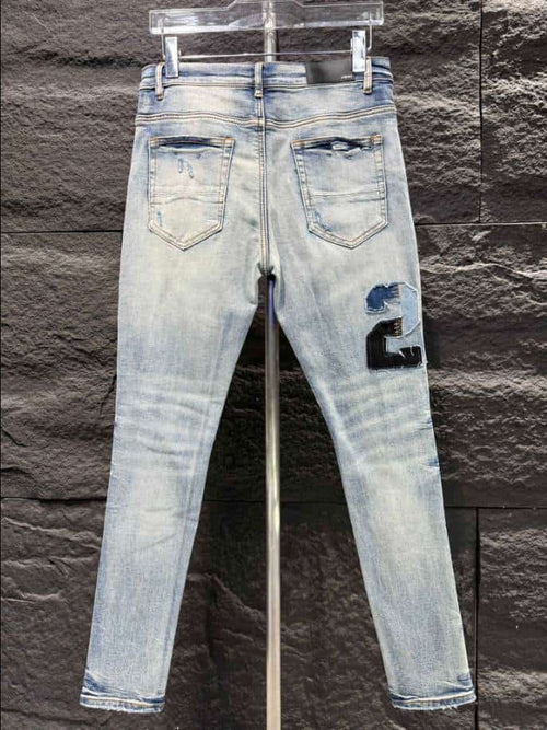 Amiri Men Varsity Ripped Blue Jeans – AMIJ016