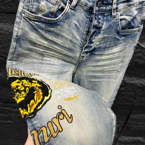 Amiri Ripp White Yellow Logo Jeans – AMIJ010