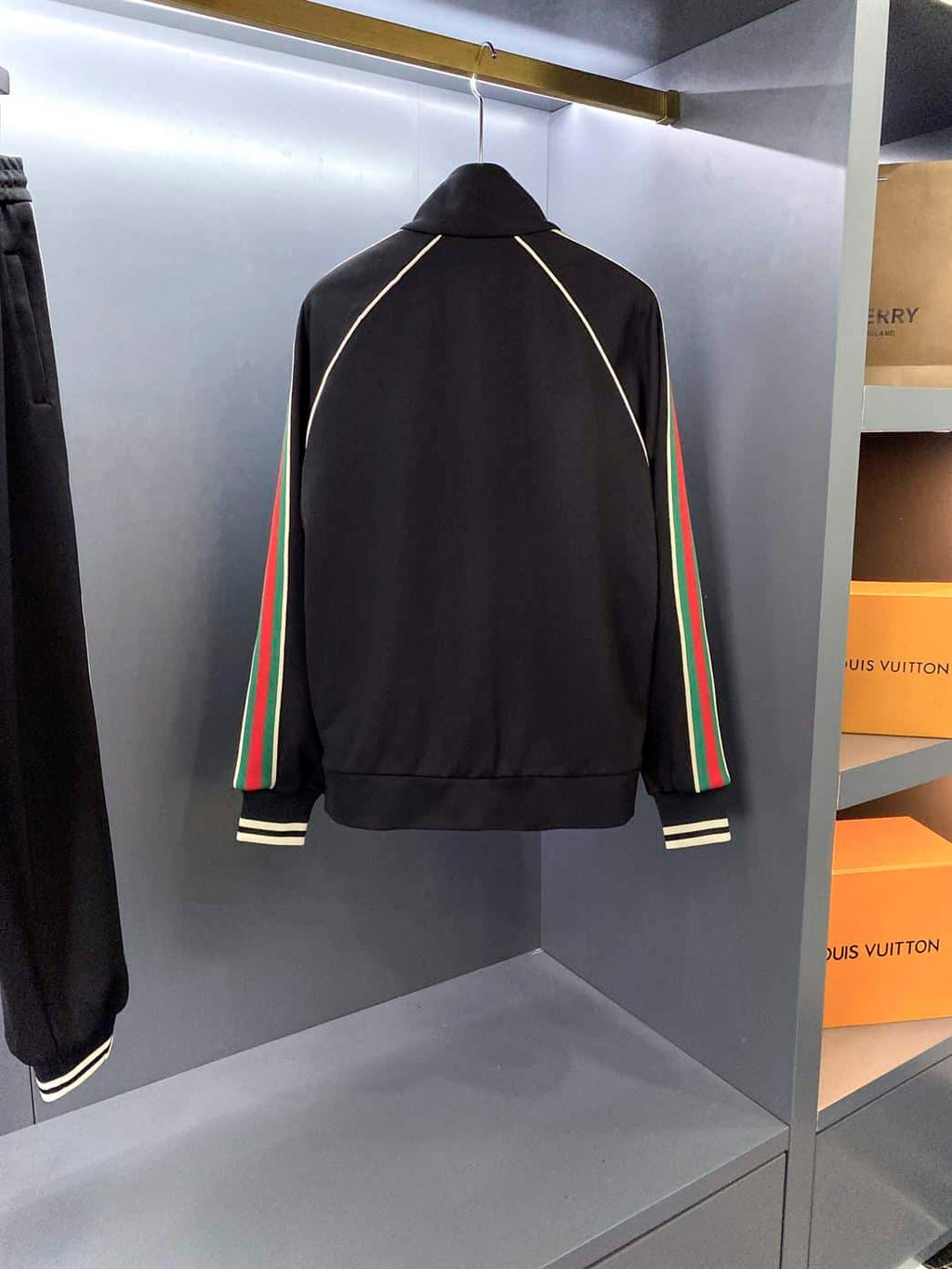 GUCCI LOGO APPLIQUED STRIPED TECH-JERSEY TRACK JACKET IN BLACK – GCJ017